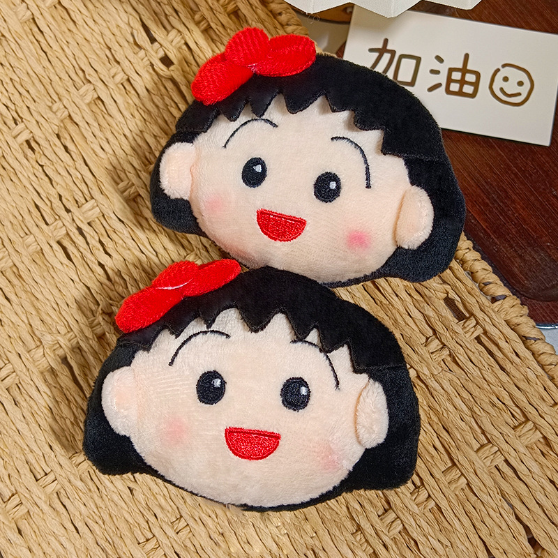 سلسلة مفاتيح لطيفة على شكل شخص - مراجعة Car Accessories Toy وسعره